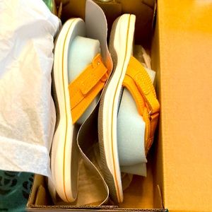 Brand new Clarks flip-flops size 6 orange
